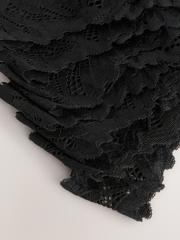 Next String 'Ultimate Comfort' in Zwart