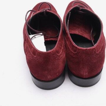 Tod's Flats & Loafers in 36 in Red