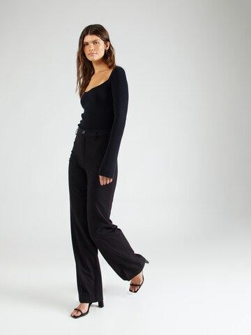 ABOUT YOU x Laura Giurcanu Regular Trousers with creases 'Christina' in Black