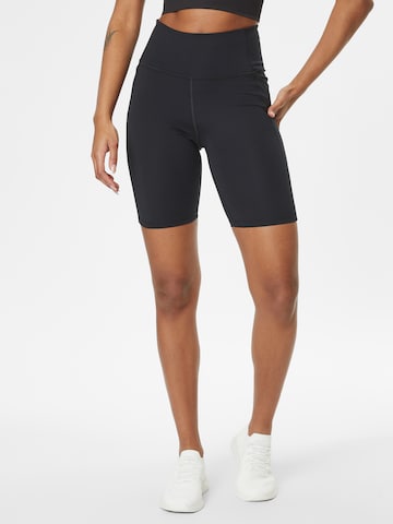 Girlfriend Collective Skinny Workout Pants in Black: front