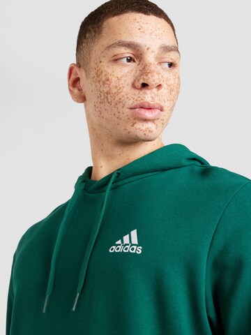 ADIDAS SPORTSWEAR Sportsweatshirt 'Essentials' in Groen