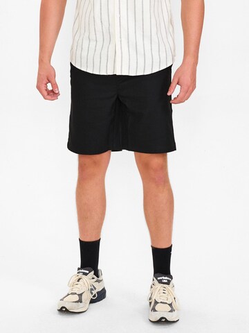 Dxnmxrk Regular Hose 'DXCharley' in Schwarz: Vorderseite