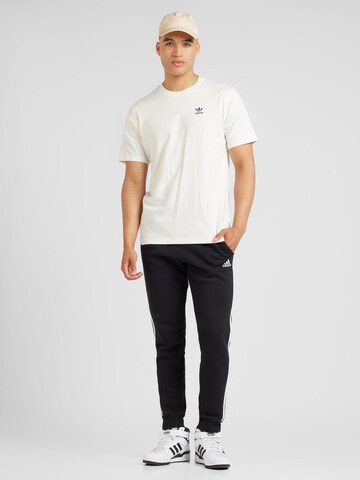 Tapered Pantaloni sport de la ADIDAS SPORTSWEAR pe negru