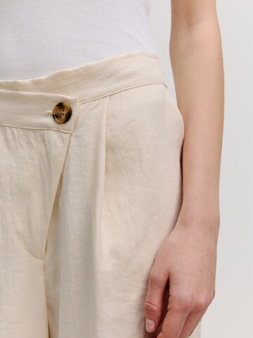 Wide leg Pantaloni 'Nena' di EDITED in beige