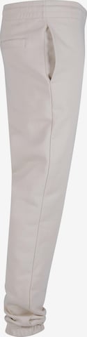 Urban Classics Zwężany krój Spodnie w kolorze beżowy