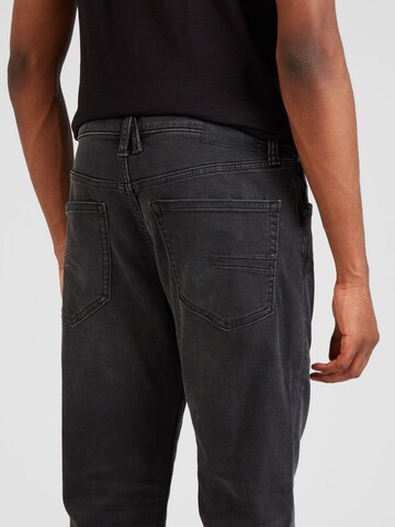 s.Oliver Tapered Jeans 'Mauro' in Grau