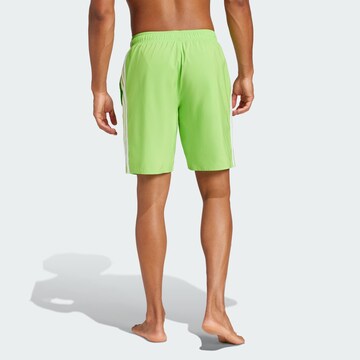 ADIDAS SPORTSWEAR Board shorts in Green