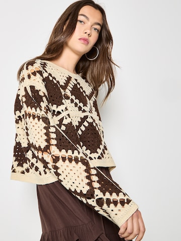 Pull-over ' ' Apricot en gris