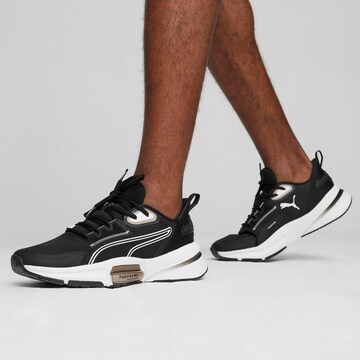 Chaussure de course 'PWRFrame TR 3' PUMA en noir