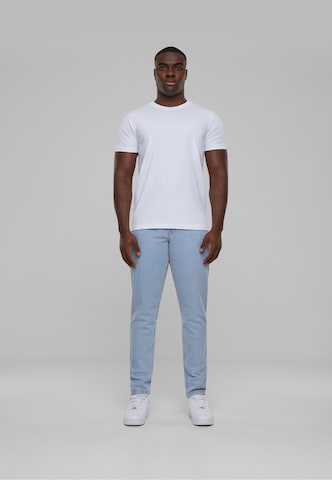 Karl Kani Tapered Jeans in Blue