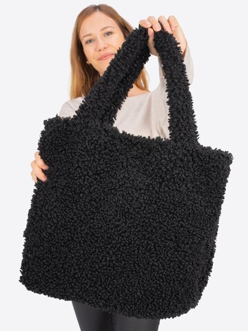 Seasons of April Schultertasche in Schwarz