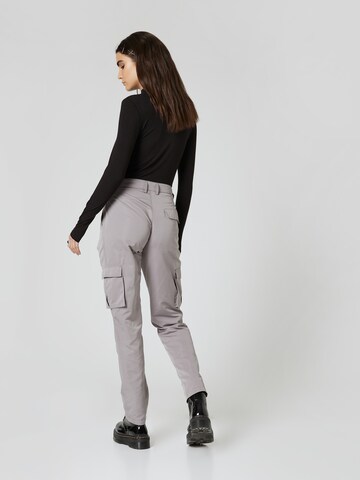 About You x Nils Kuesel Tapered Trousers 'Iven' in Grey