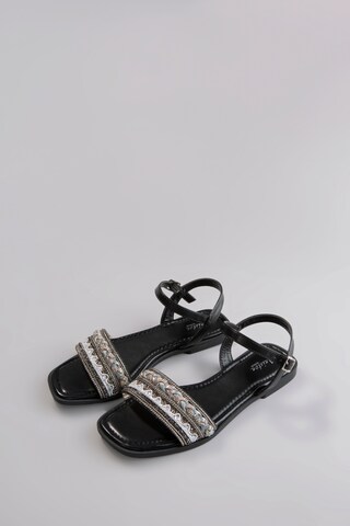 Aniston Strap Sandals in Black: front