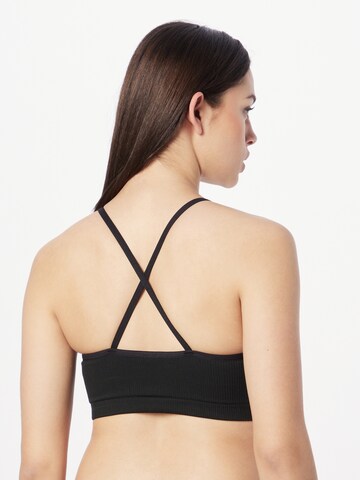 NIKE - Soutien Bustier Soutien de desporto em preto