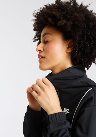 Nike Sportswear Jogginganzug 'Essential' in Schwarz