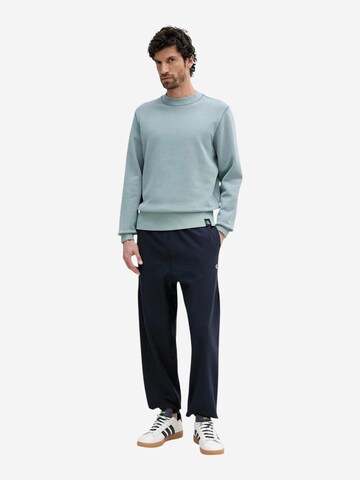 Calvin Klein Jeans Regular Sportbroek 'PREMIUM TERRY MONOGR LV04RC279G' in Blauw