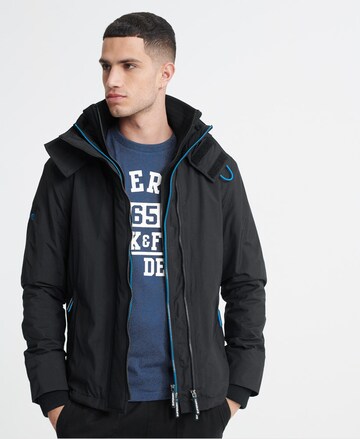 Superdry Between-Season Jacket 'Arctic' in Black: front