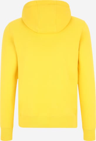 TOMMY HILFIGER Regularny krój Bluzka sportowa w kolorze żółty