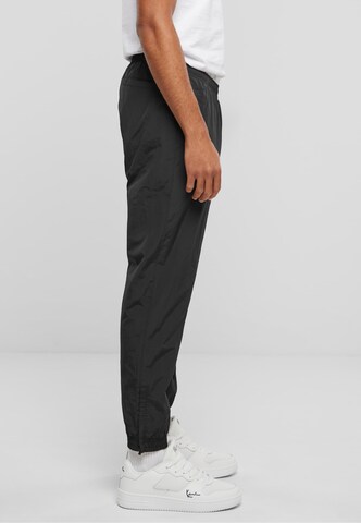 Effilé Pantalon Karl Kani en noir