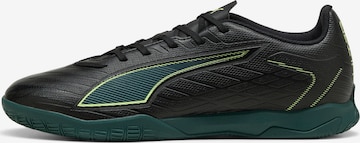 PUMA Soccer Cleats in Black: front