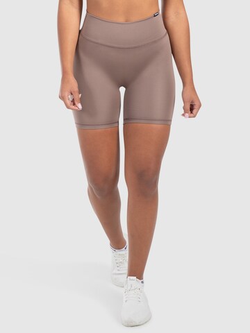 Skinny Pantalon de sport Smilodox en marron : devant