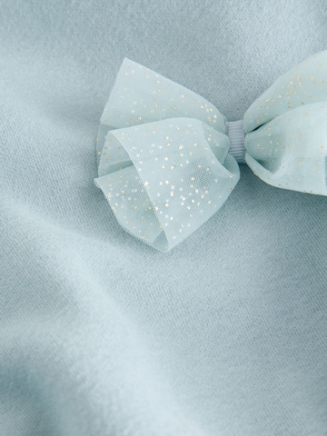Set Next en bleu