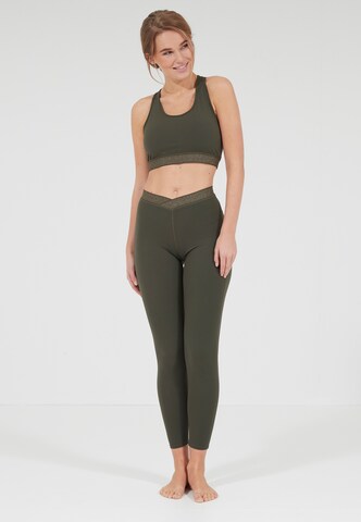 Athlecia Slim fit Workout Pants 'Feliz' in Green