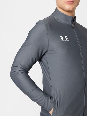 Chándal Under Armour Challenger II Knit Warm-Up en color negro por