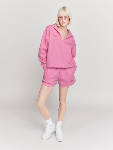 UNFOLLOWED x ABOUT YOU Regular Hose  'BUBBLEGUM' in Pink
