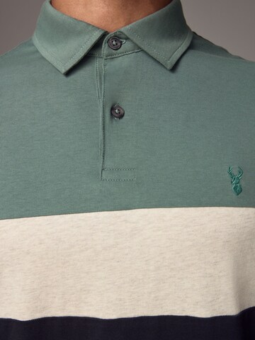 Next Poloshirt in Grün