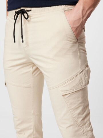 TOM TAILOR DENIM Tapered Cargo Pants in Beige