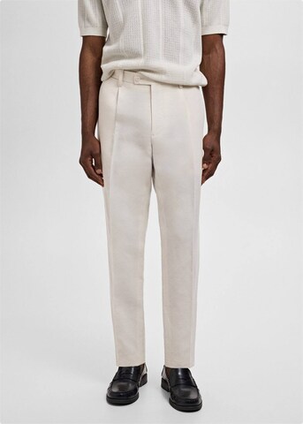 MANGO MAN Slim fit Pleat-Front Pants 'Ethereal' in Beige: front
