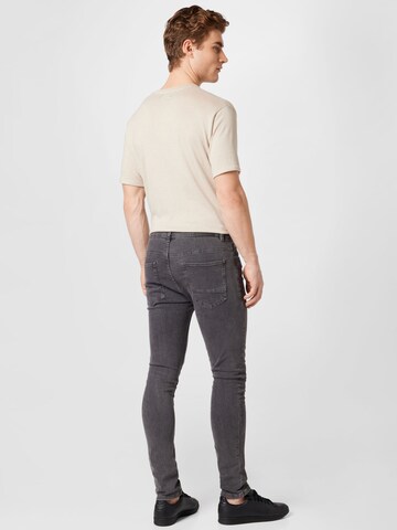 BURTON MENSWEAR LONDON Skinny Jeansy w kolorze szary