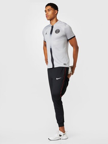 Regular Pantalon de sport 'FC Libero' NIKE en noir