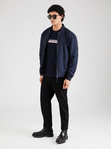 TOMMY HILFIGER Tussenjas in Blauw