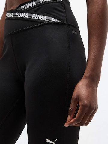 PUMA Skinny Sportnadrágok 'Strong' - fekete