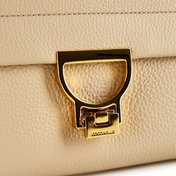 Borsa a mano 'Arlettis' di Coccinelle in beige