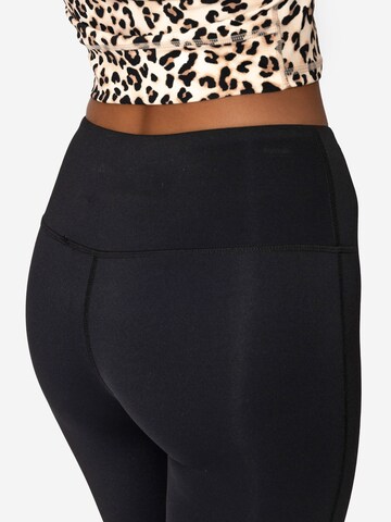 SASSYCLASSY Flared Pants in Black