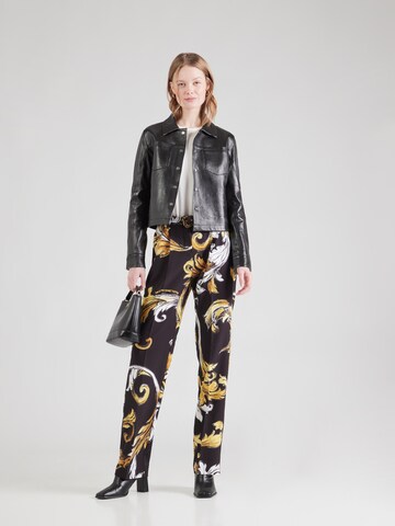 Tapered Pantaloni con piega frontale di Versace Jeans Couture in nero