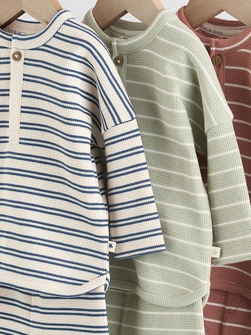 Set Next en bleu