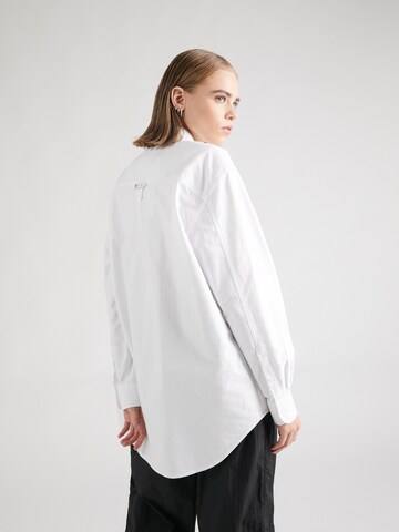 Tommy Jeans - Blusa en blanco