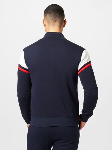 Champion Authentic Athletic Apparel Trainingspak in Blauw