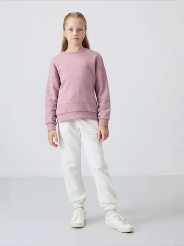 Tommy Life Bluzka sportowa 'TOMMY Jugend-Unisex-Sweatshirt Aus Baumwollmischung' w kolorze zielony