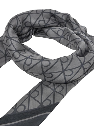 Calvin Klein Scarf 'EMBLEM AOP JACQUARD SQUARE SCARF LV04F8080G' i svart