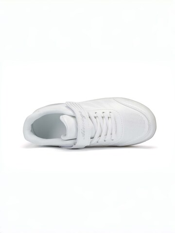 HUSKSWARE Inline and Roller Skates in White