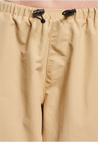 Karl Kani - Loosefit Pantalón en beige