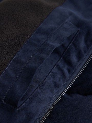 Next - Chaleco en azul