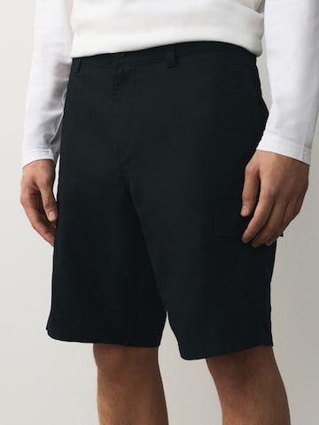 Next - Loosefit Pantalón cargo en negro: frente