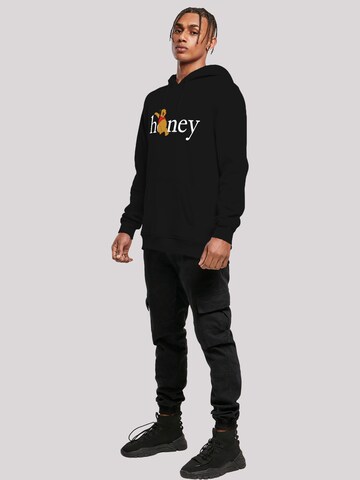 F4NT4STIC Sweatshirt 'Disney Winnie Puuh Der Bär Honig' in Zwart