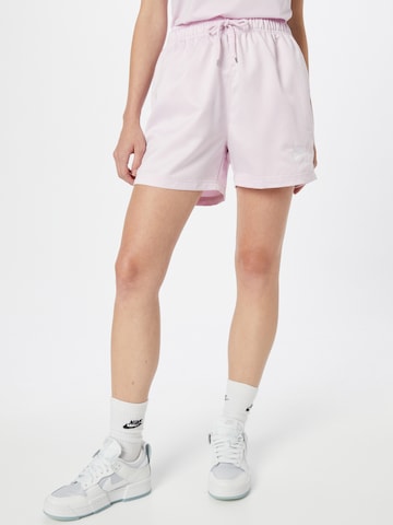 Nike Sportswear Loose fit Trousers in Pink: front